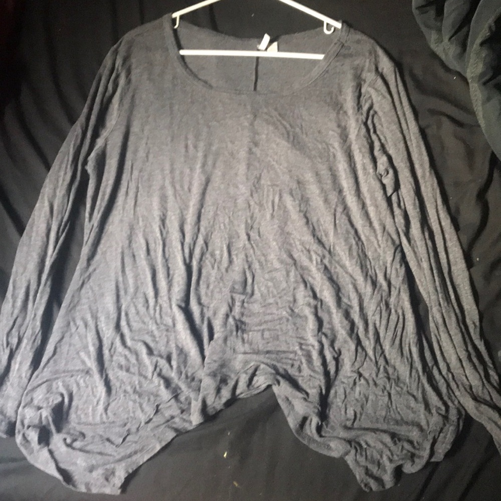 grey long sleeve, ruffled bottom.